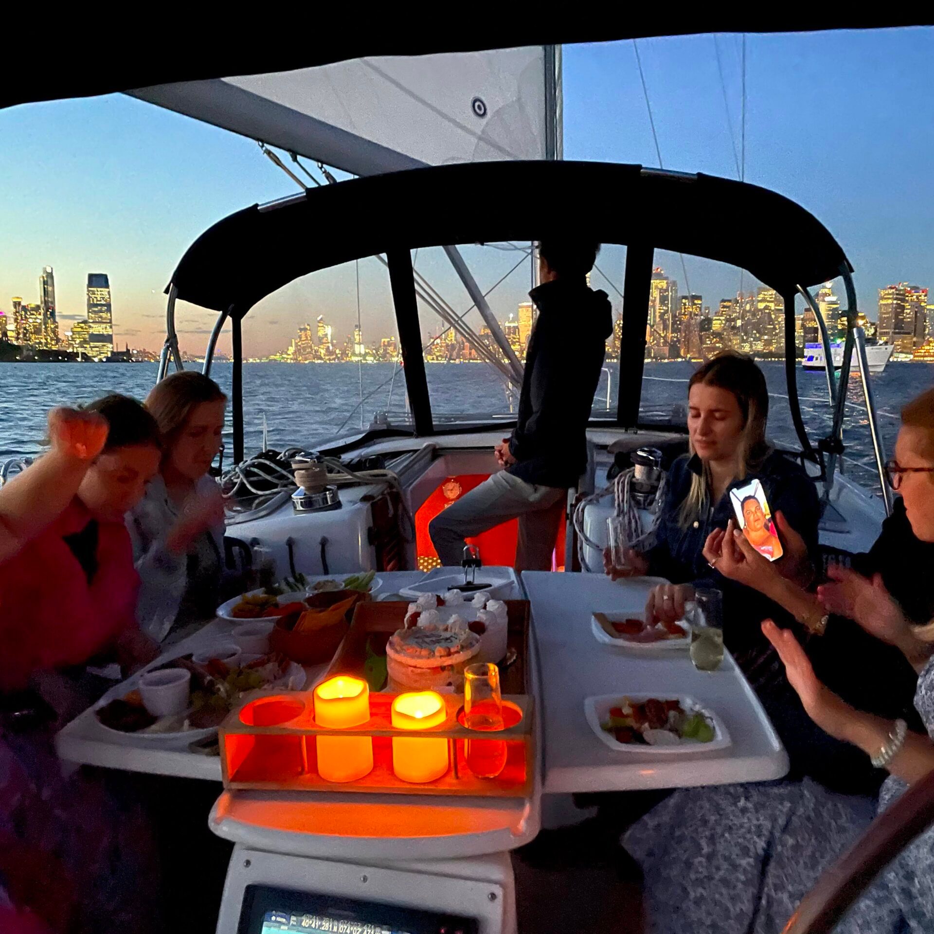 candles on the deck of a boat during a New York night cruise