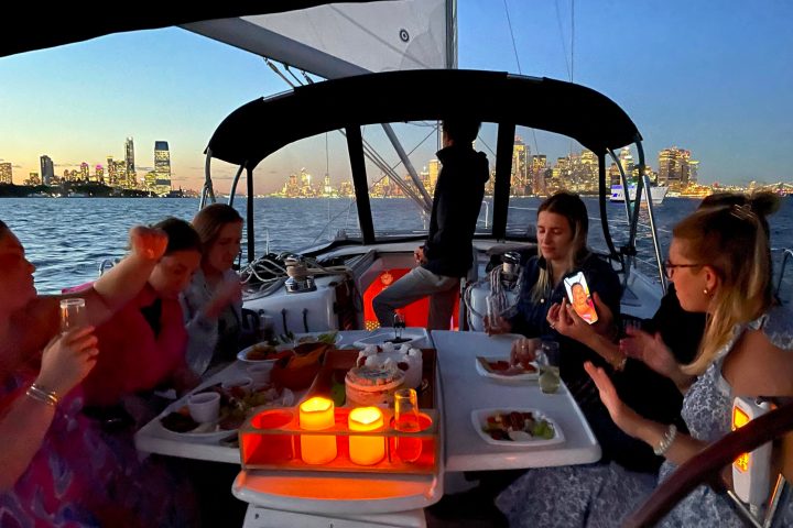 candles on the deck of a boat during a New York night cruise