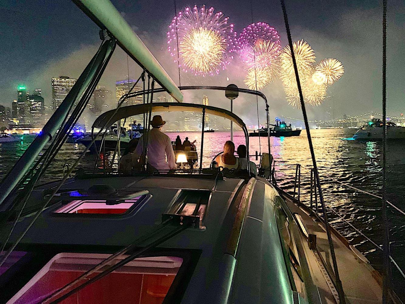 boat rental 4th of July with fireworks overhead