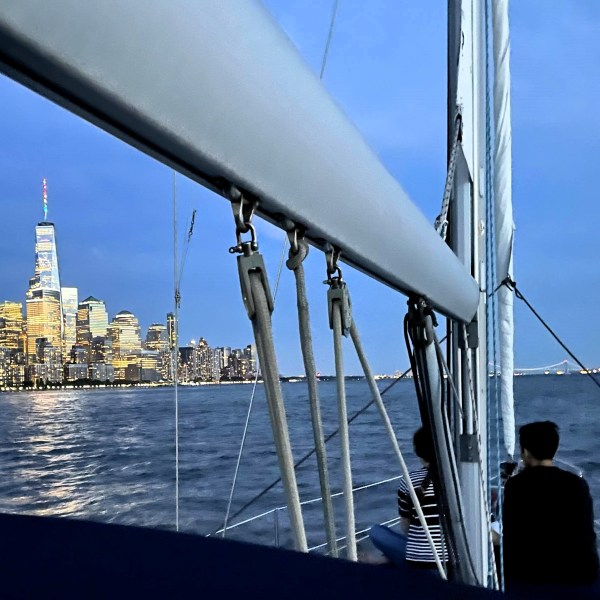 couple on a sailboat in New York during a night boat tour