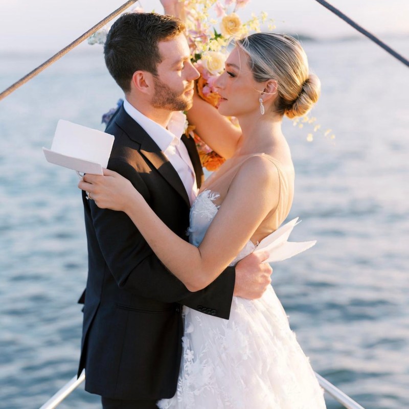 couple at the bow of a boat during a NYC boat proposal