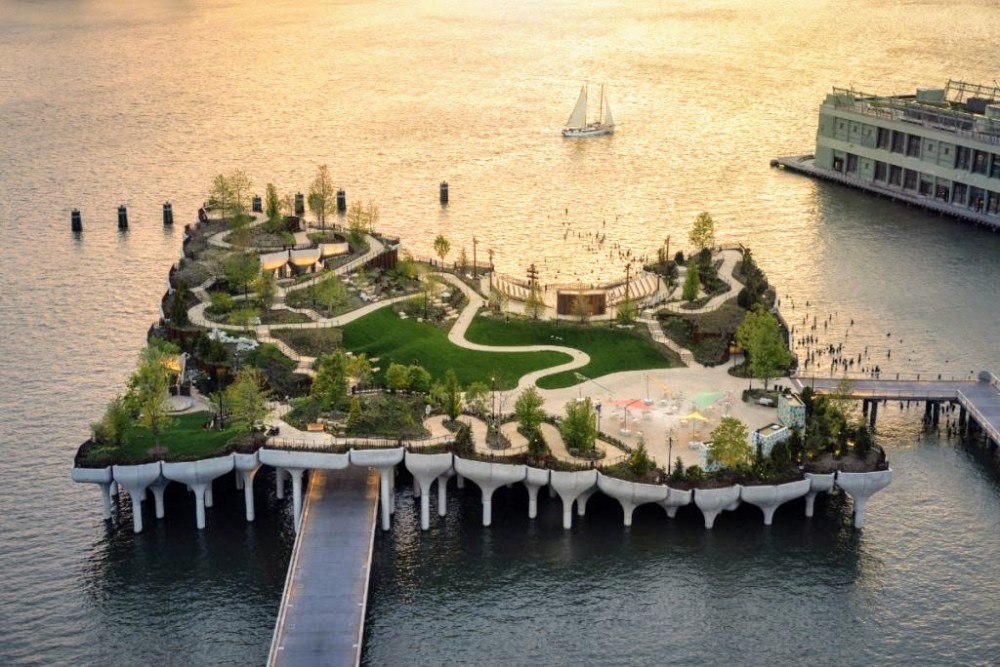 Manhattan boat charters sailing past Little Island in New York City