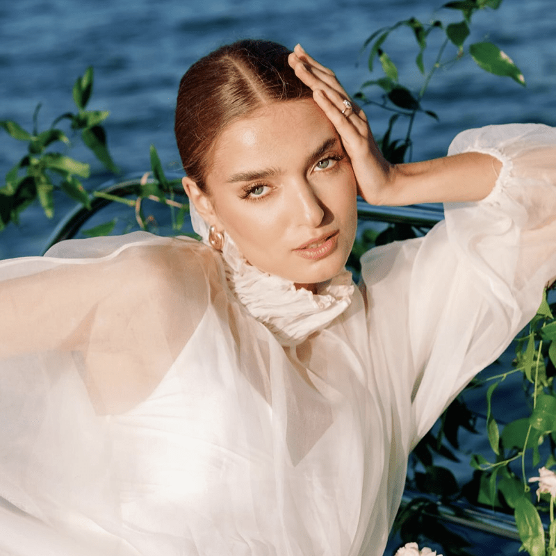 woman in wedding dress during a romantic boat ride in NYC