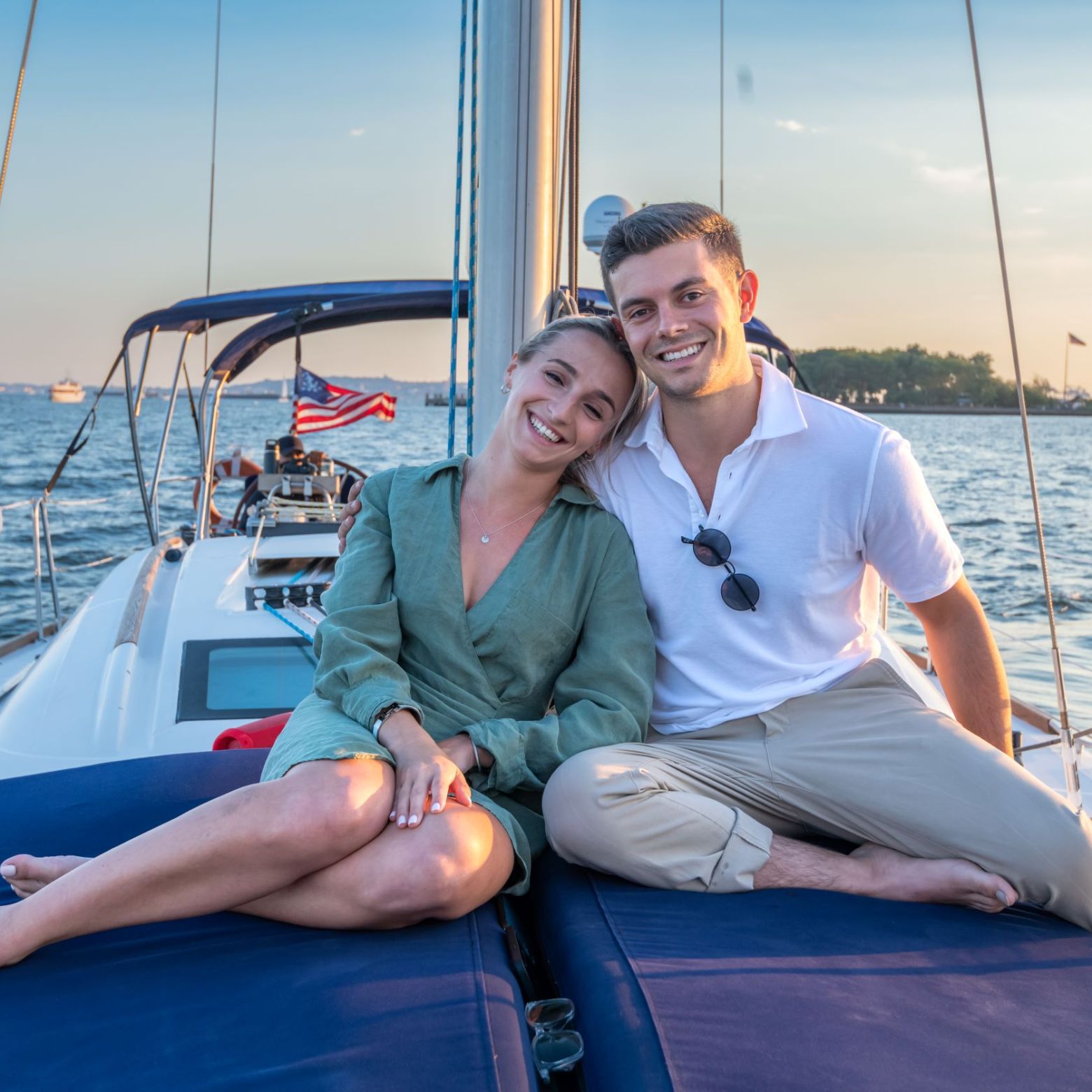 couple sitting on a sailboat for a romantic sailing nyc experience