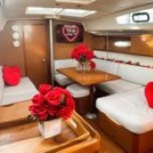 boat cabin full of red roses for a romantic marriage proposal in NY